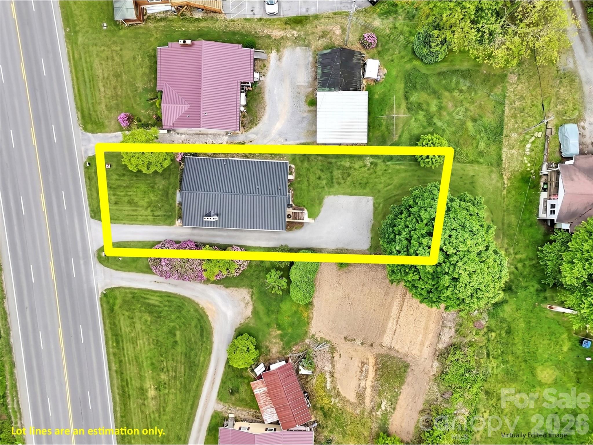 3575 Dellwood Road Waynesville, NC 28786 - Photo 42 of 43 an aerial view of a swimming pool with yard
