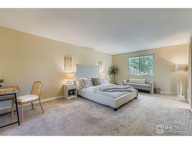 a living room with furniture and window