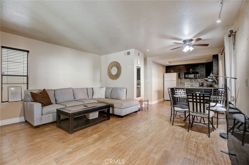 23 Pearl Laguna Niguel, CA 92677 - Photo 4 of 37 a living room with furniture and view of kitchen