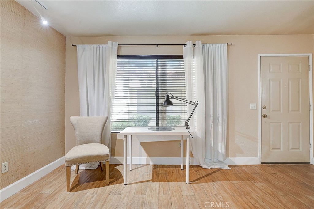 23 Pearl Laguna Niguel, CA 92677 - Photo 6 of 37 a chair and a table in a room