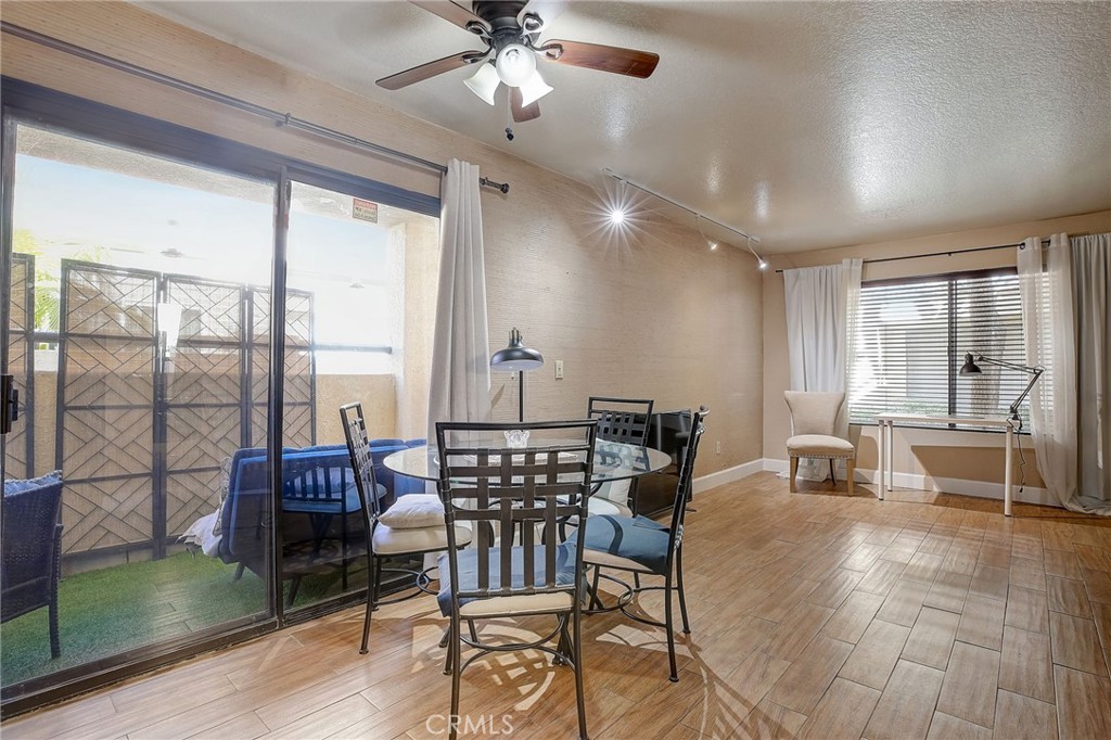 23 Pearl Laguna Niguel, CA 92677 - Photo 8 of 37 a view of a dining room with furniture window and wooden floor