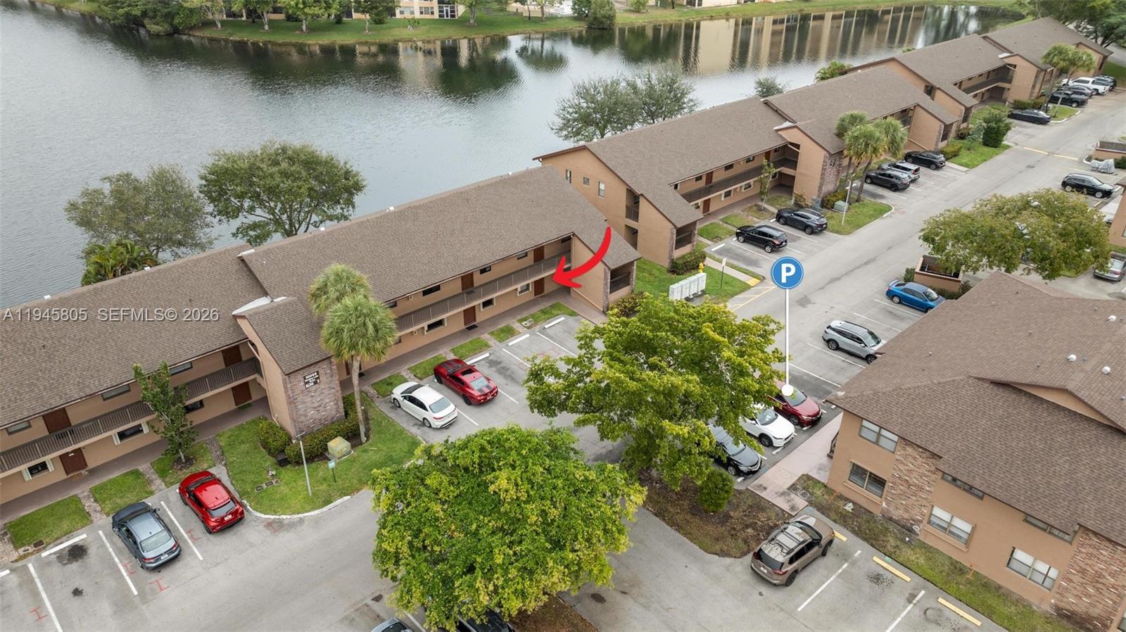 10005 Winding Lake Road, Unit 106 Sunrise, FL 33351 - Photo 30 of 41 an aerial view of a house with outdoor space and lake view