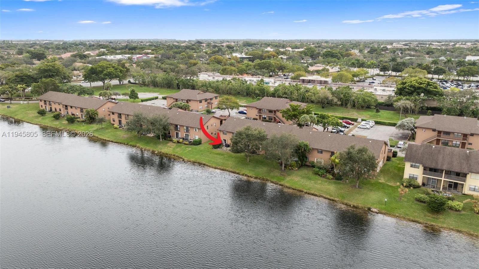 10005 Winding Lake Road, Unit 106 Sunrise, FL 33351 - Photo 35 of 41 an aerial view of residential houses with outdoor space and lake view