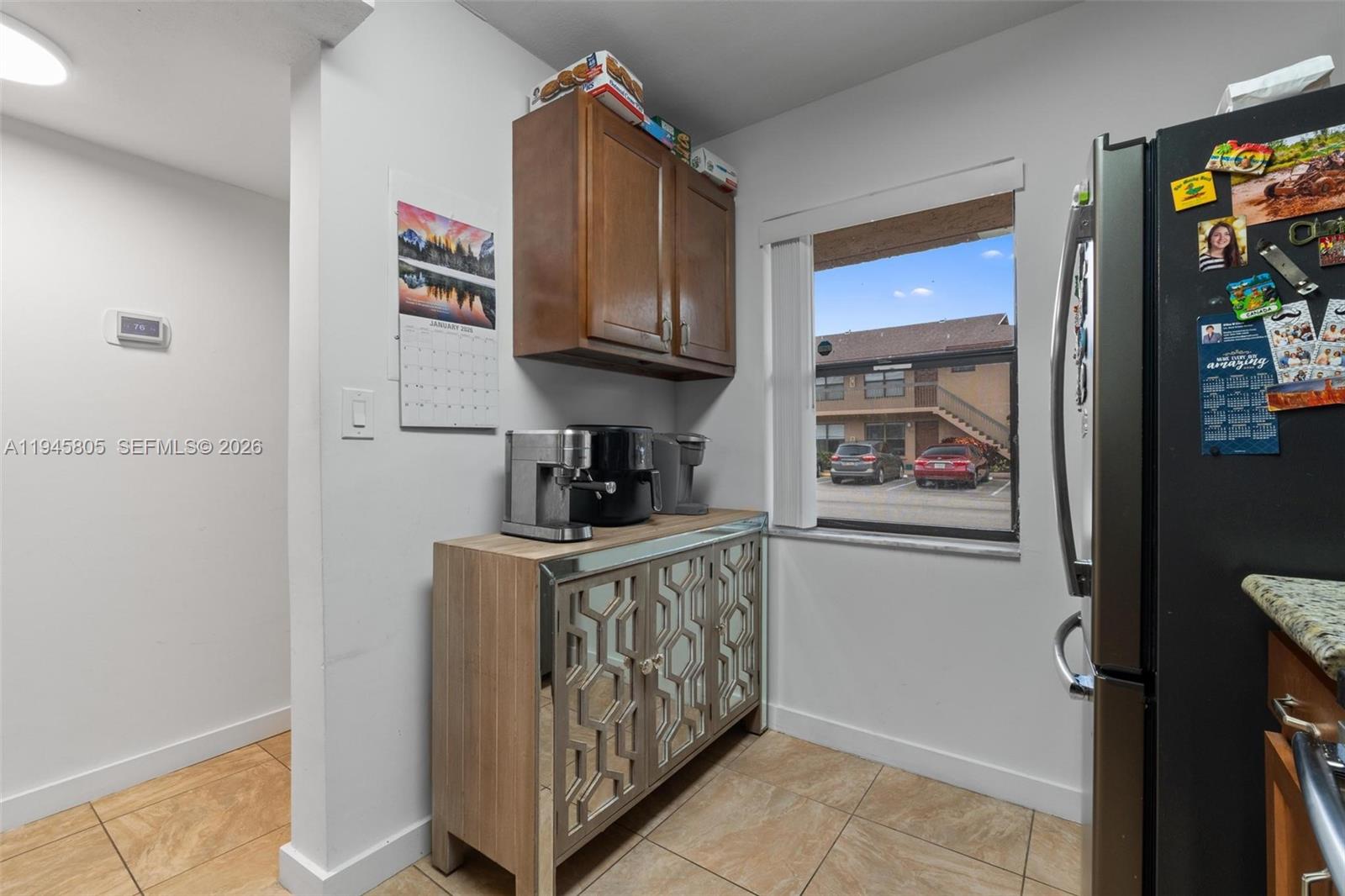 10005 Winding Lake Road, Unit 106 Sunrise, FL 33351 - Photo 6 of 41 a room with storage and utility