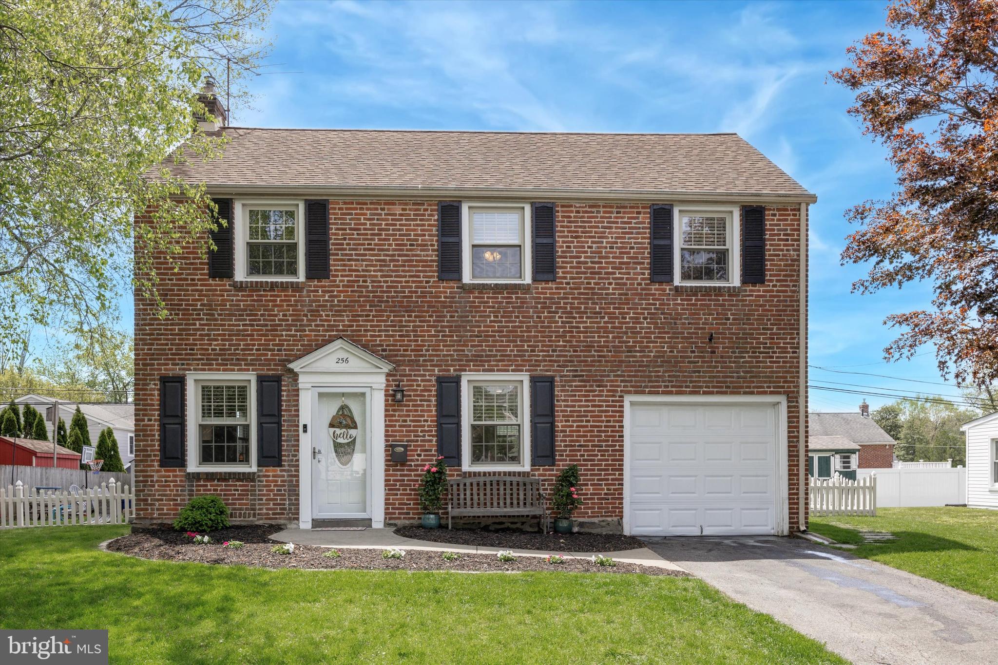 256 Ridgewood Road Springfield, PA 19064 - Photo 2 of 32 front view of a house with a yard