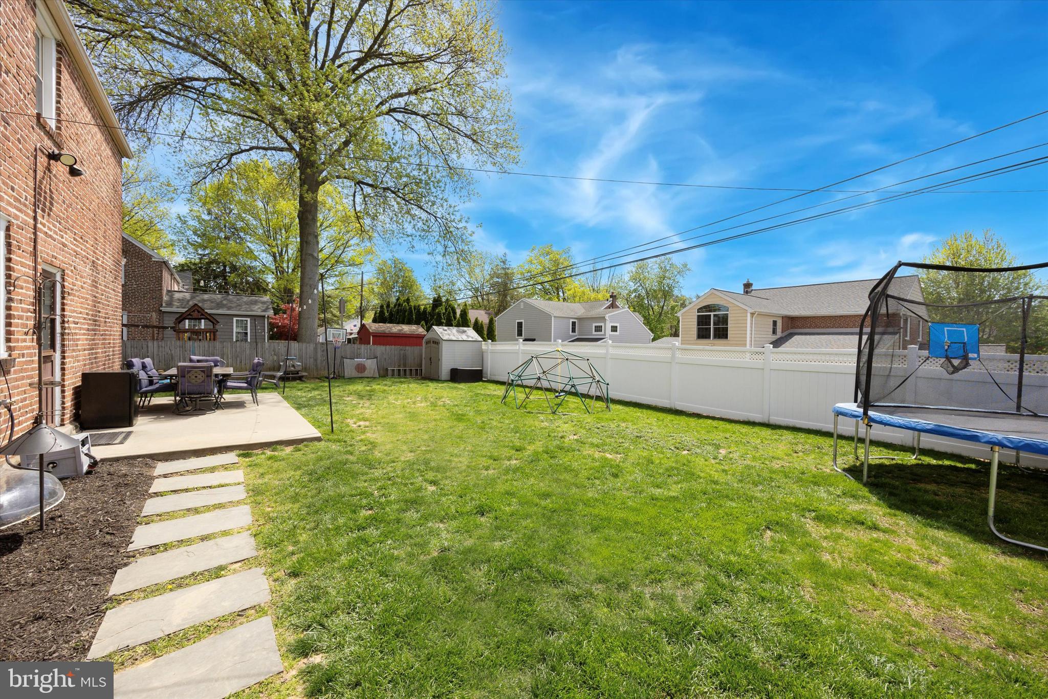 256 Ridgewood Road Springfield, PA 19064 - Photo 32 of 32 a view of a swimming pool with a patio