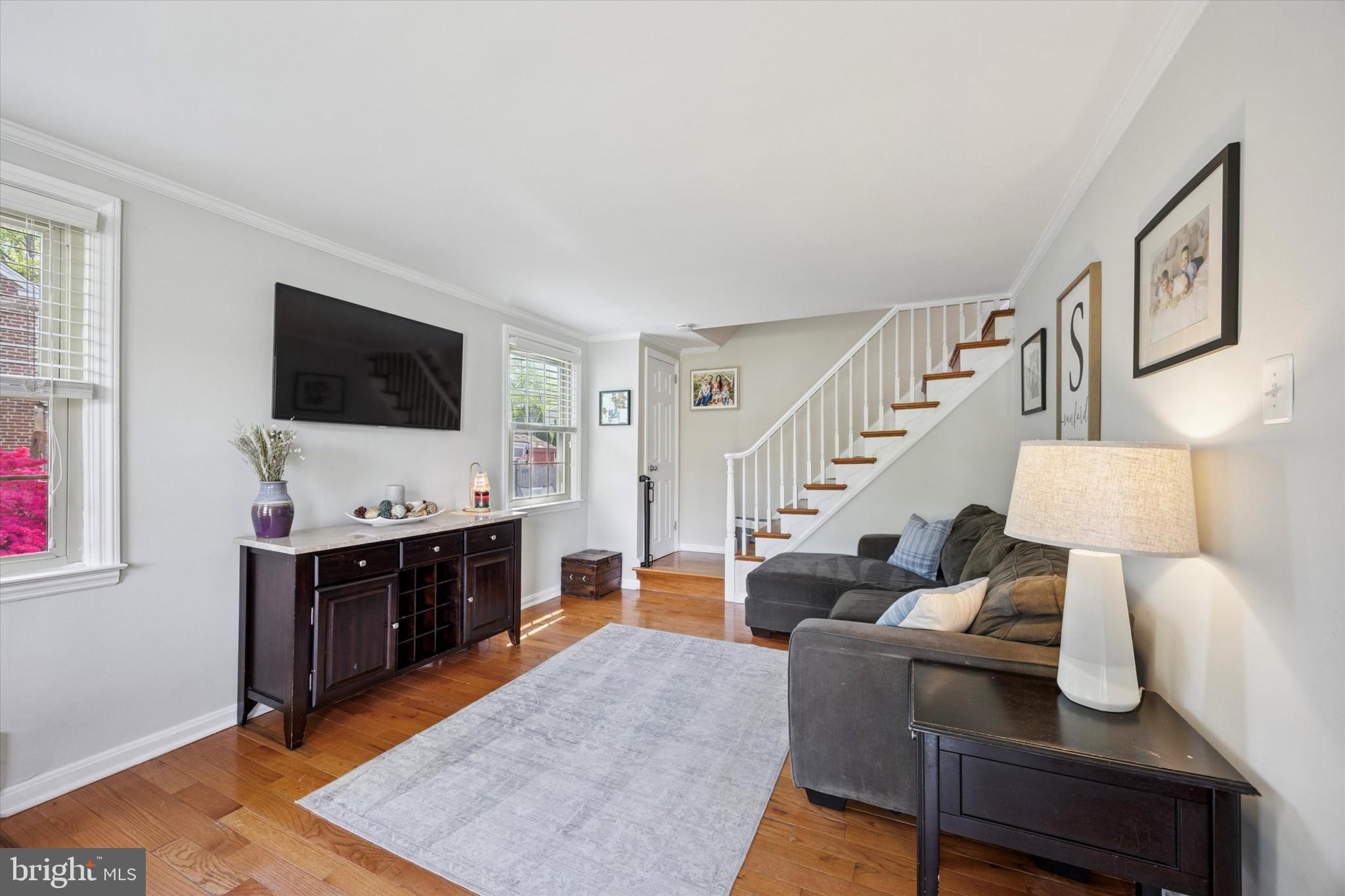 256 Ridgewood Road Springfield, PA 19064 - Photo 4 of 32 a living room with furniture and a flat screen tv