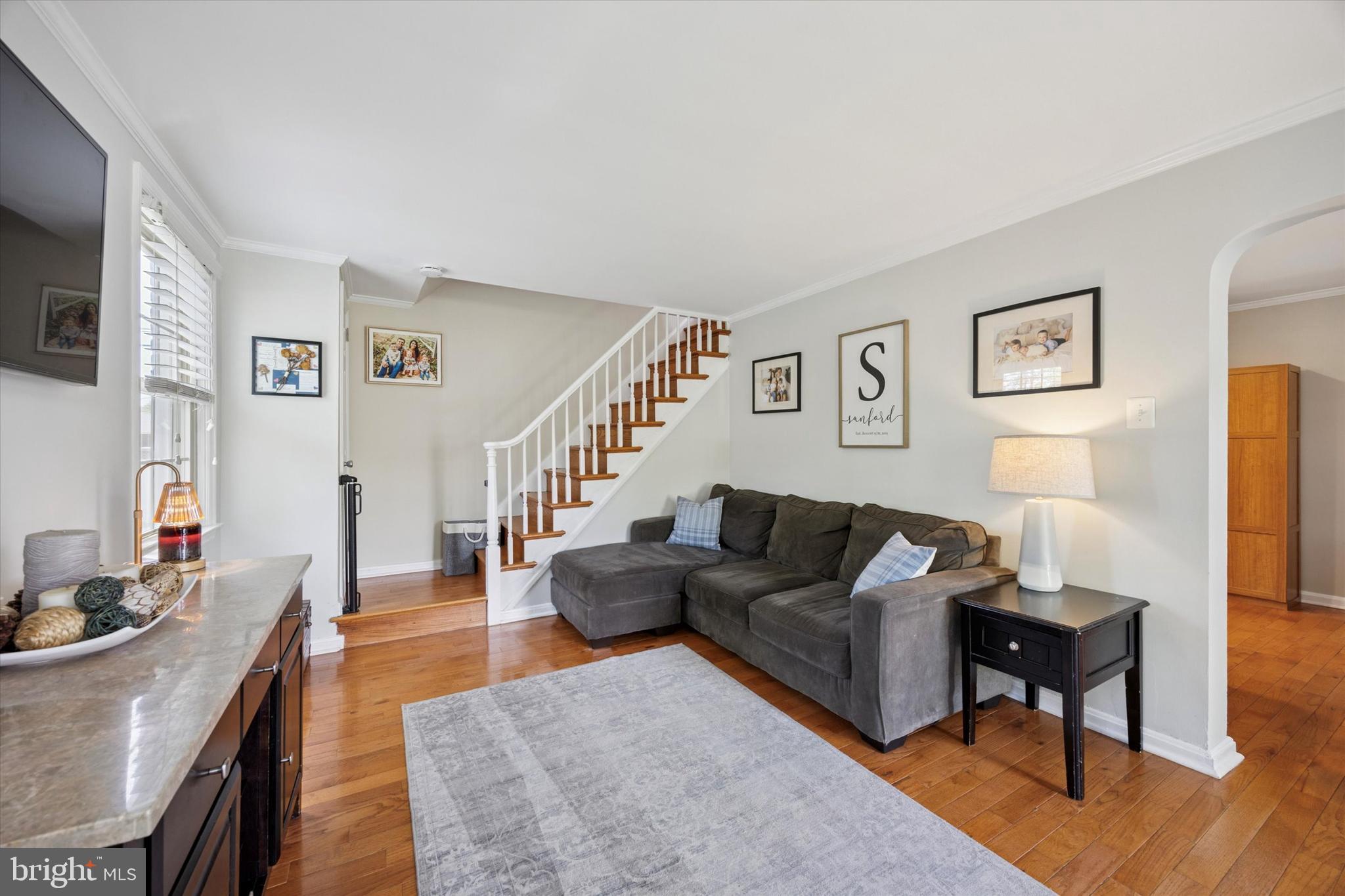 256 Ridgewood Road Springfield, PA 19064 - Photo 5 of 32 a living room with furniture and a wooden floor