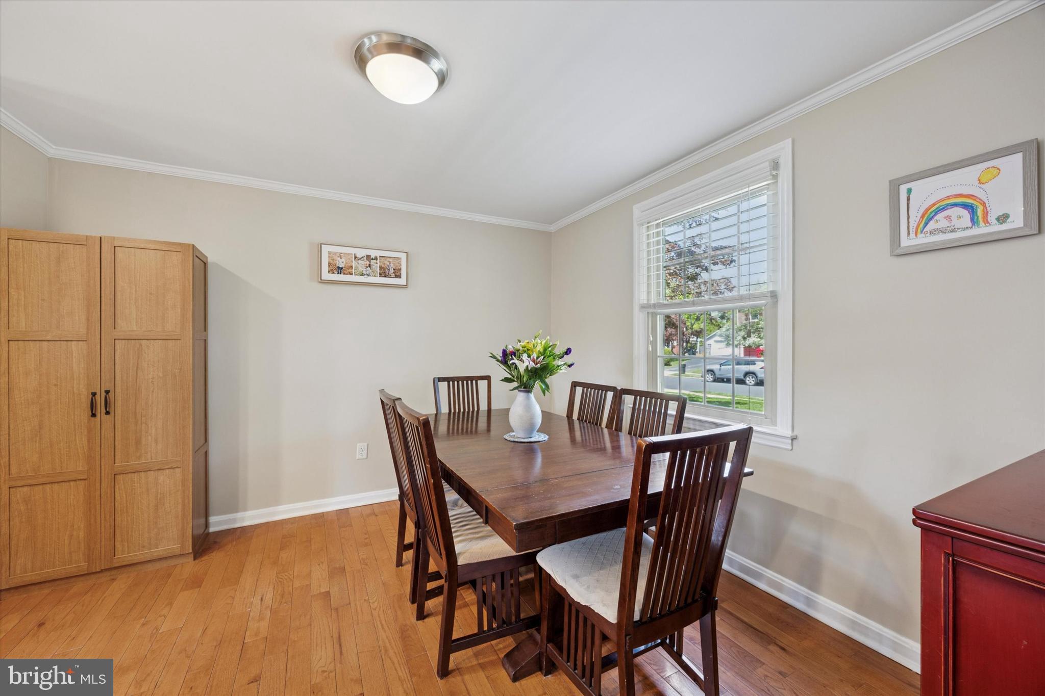 256 Ridgewood Road Springfield, PA 19064 - Photo 8 of 32 a view of a dining room with furniture window and wooden floor