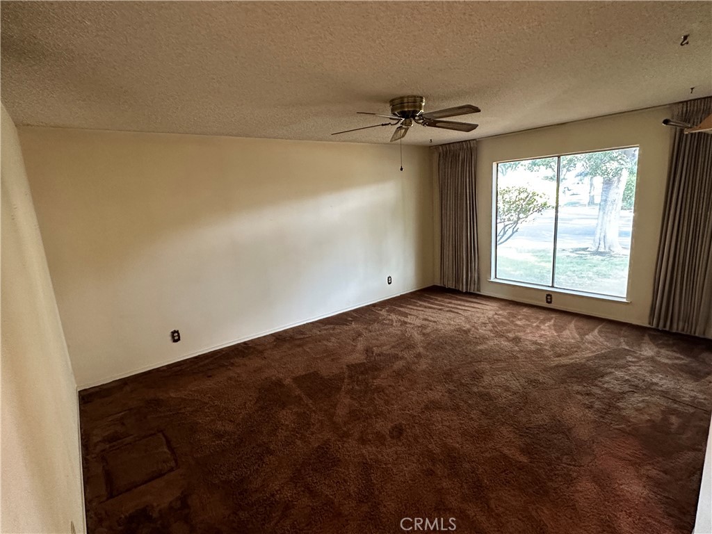 602 Elise Court Merced, CA 95340 - Photo 7 of 20 a view of empty room with window