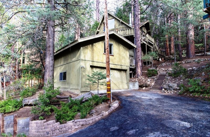 25390 Shadow Oaks Idyllwild, CA 92549 - Photo 1 of 39 a backyard of a house with lots of green space