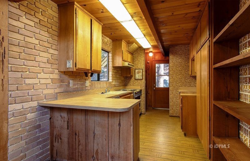 25390 Shadow Oaks Idyllwild, CA 92549 - Photo 15 of 39 a bathroom with a sink and a mirror