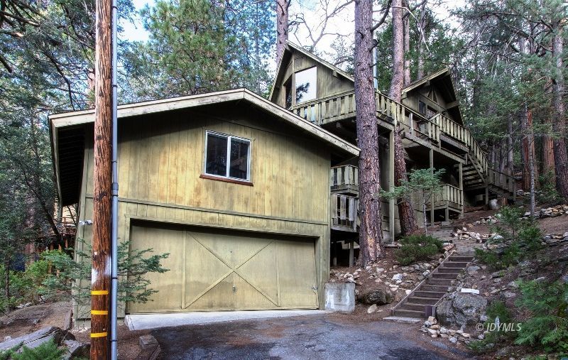 25390 Shadow Oaks Idyllwild, CA 92549 - Photo 2 of 39 a house with trees in the background