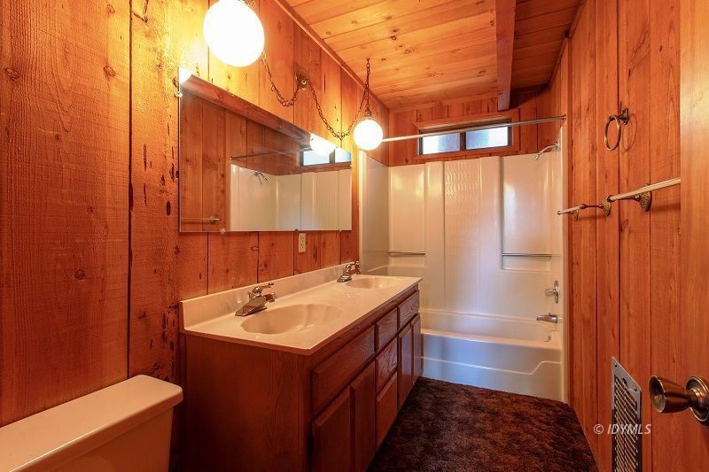 25390 Shadow Oaks Idyllwild, CA 92549 - Photo 21 of 39 a bathroom with a sink and a mirror