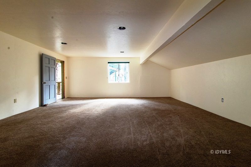 25390 Shadow Oaks Idyllwild, CA 92549 - Photo 31 of 39 a view of an empty room with a window