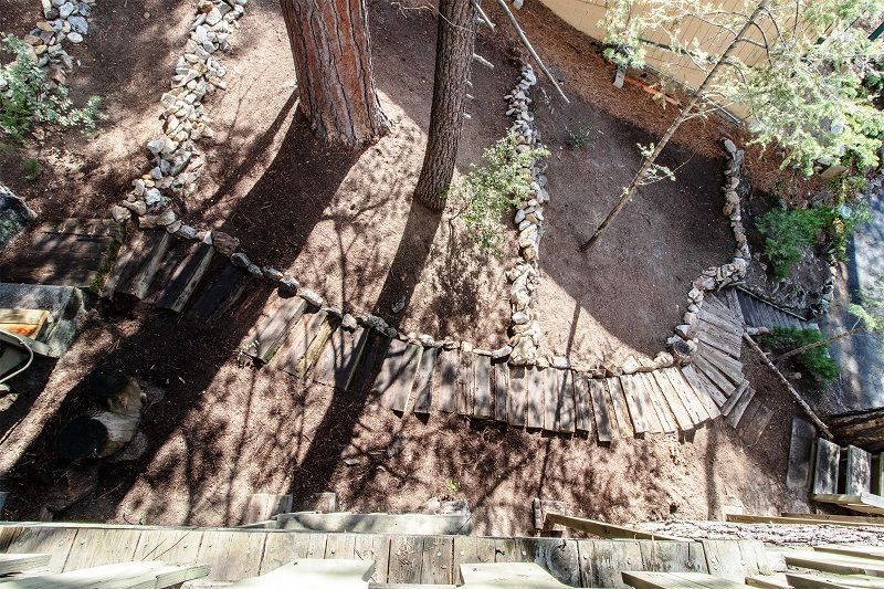 25390 Shadow Oaks Idyllwild, CA 92549 - Photo 35 of 39 a backyard of a house with large trees