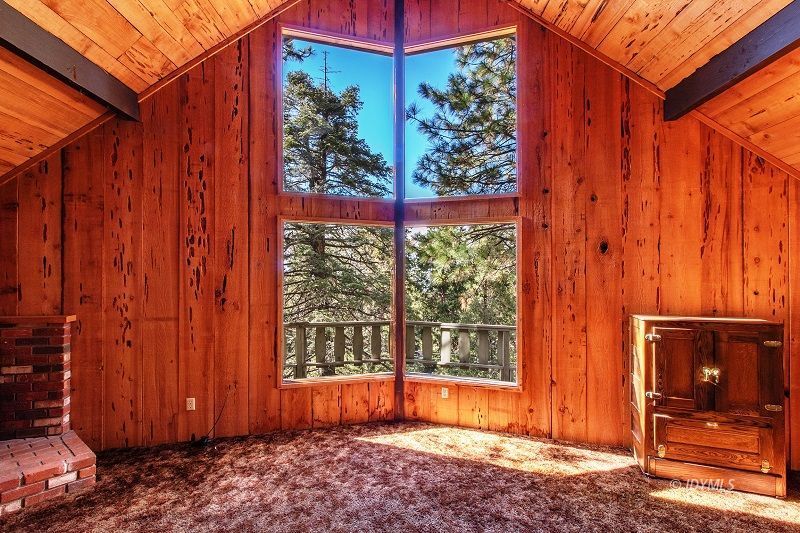 25390 Shadow Oaks Idyllwild, CA 92549 - Photo 10 of 39 a view of a backyard with hardwood and door