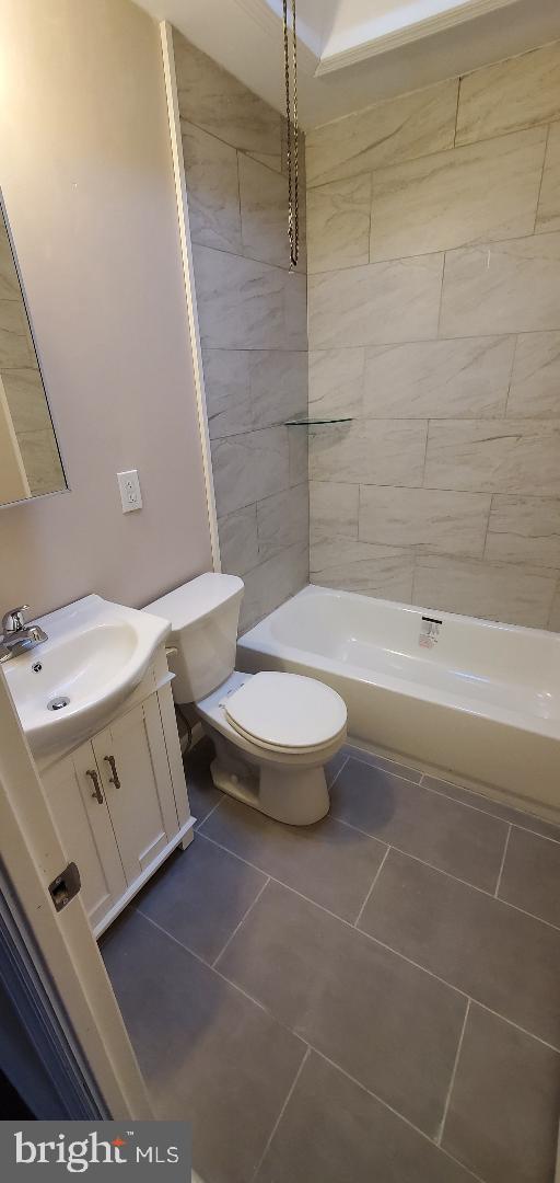 7220 Lamport Road Upper Darby, PA 19082 - Photo 12 of 14 a bathroom with a toilet and a tub