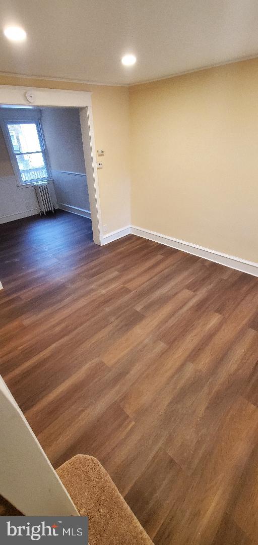 7220 Lamport Road Upper Darby, PA 19082 - Photo 3 of 14 an empty room with wooden floor and windows