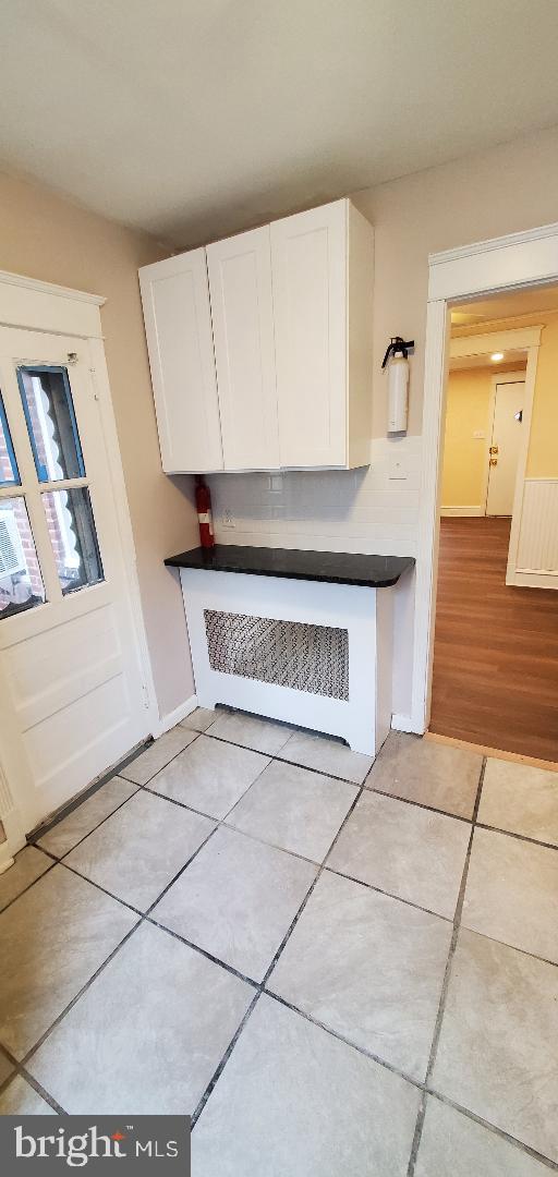 7220 Lamport Road Upper Darby, PA 19082 - Photo 7 of 14 a view of a livingroom with an empty space and a window