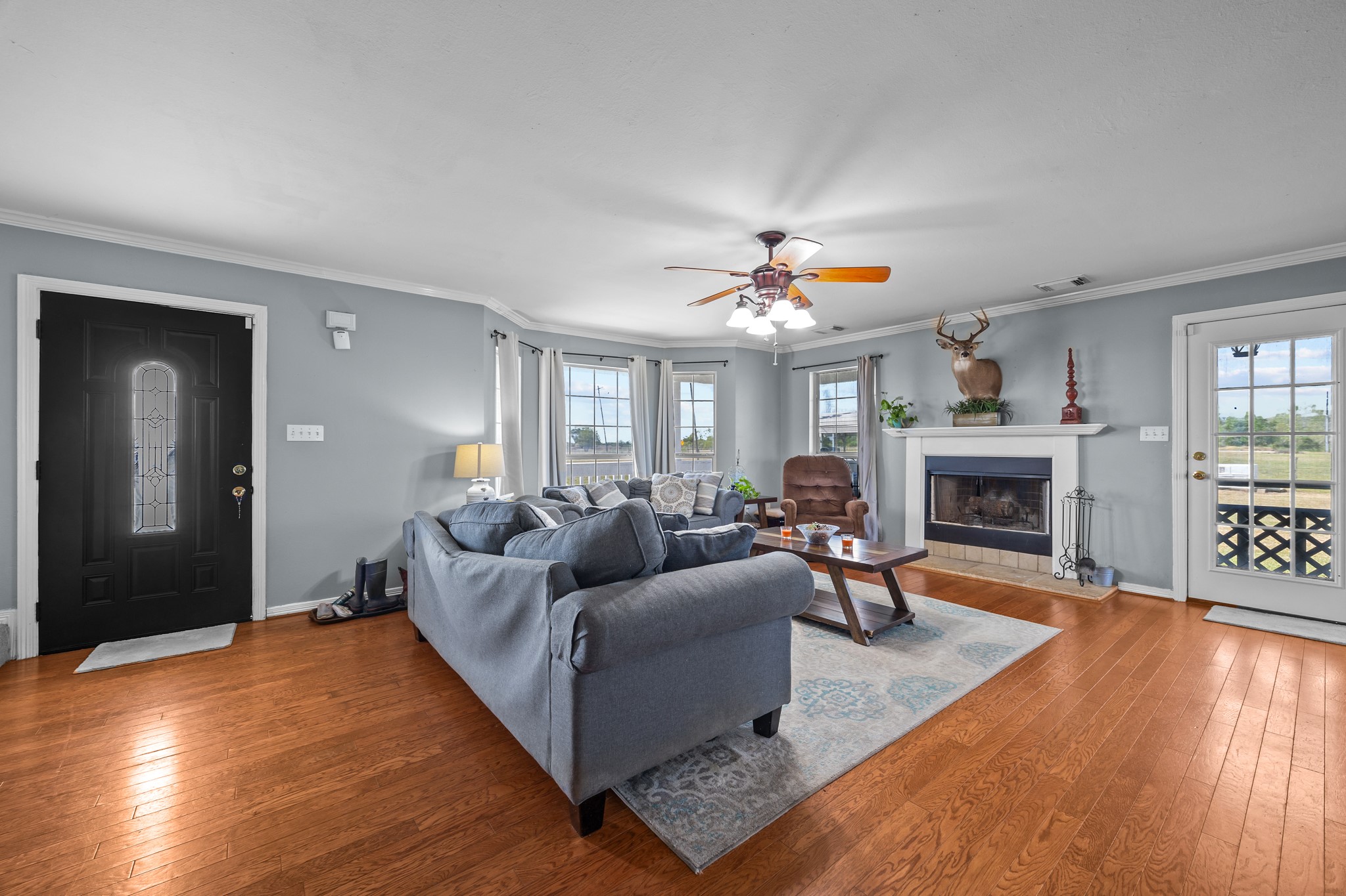 6503 County Road 208 Angleton, TX 77515 - Photo 5 of 38 a living room with furniture and a fireplace