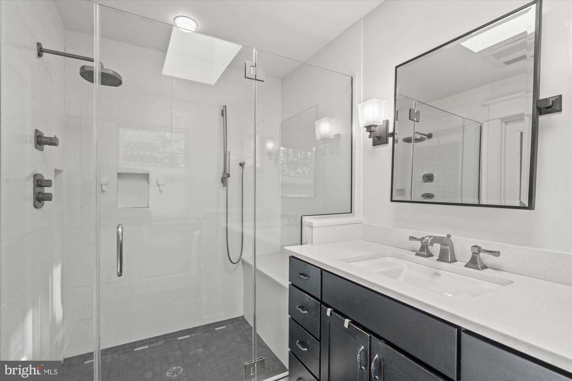 307 East Glebe Road Alexandria, VA 22305 - Photo 27 of 52 Light-filled primary en suite bathroom