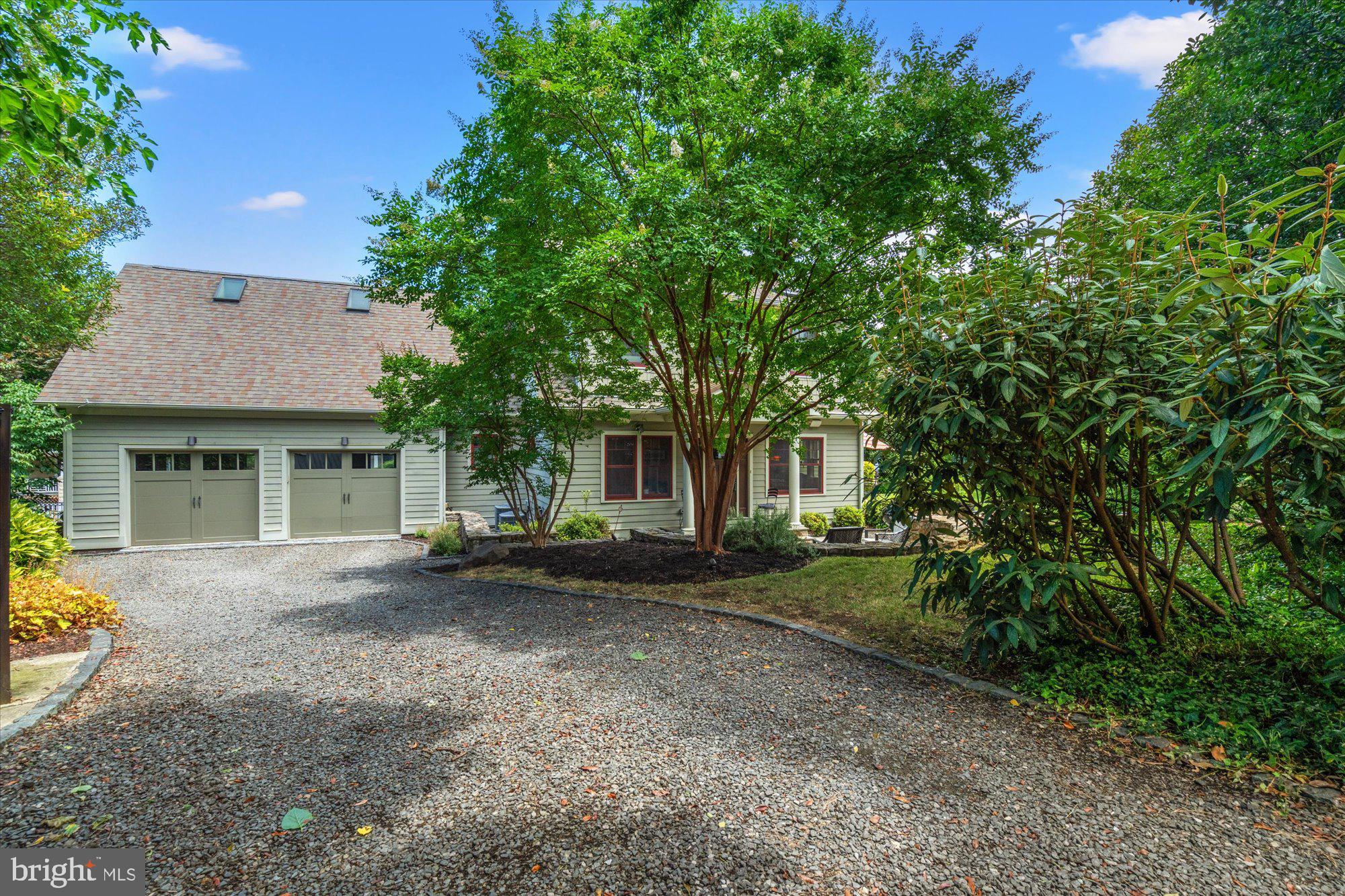 307 East Glebe Road Alexandria, VA 22305 - Photo 3 of 52 Private driveway leading to attached 2-car garage