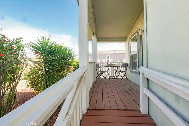 a view of balcony with furniture
