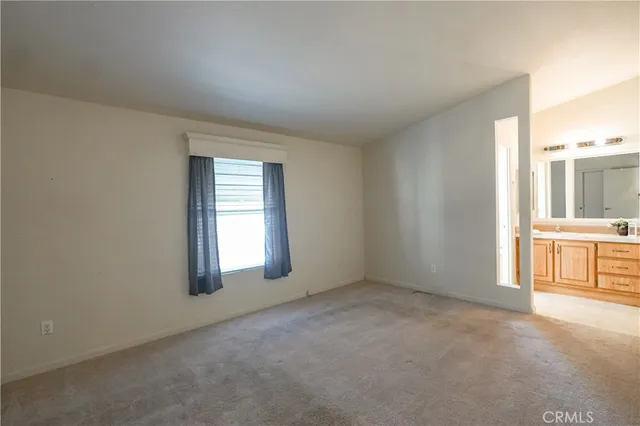 a view of a room with a sink and a window