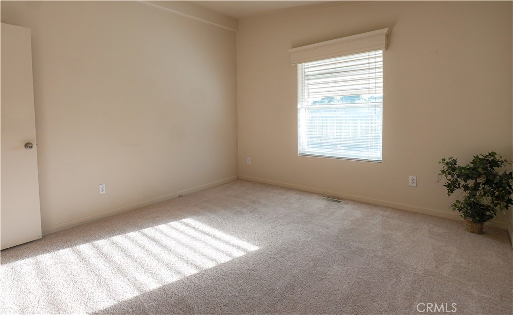 2240 Golden Oak Lane, Unit 147 Merced, CA 95341 - Photo 10 of 20 an empty room with a window