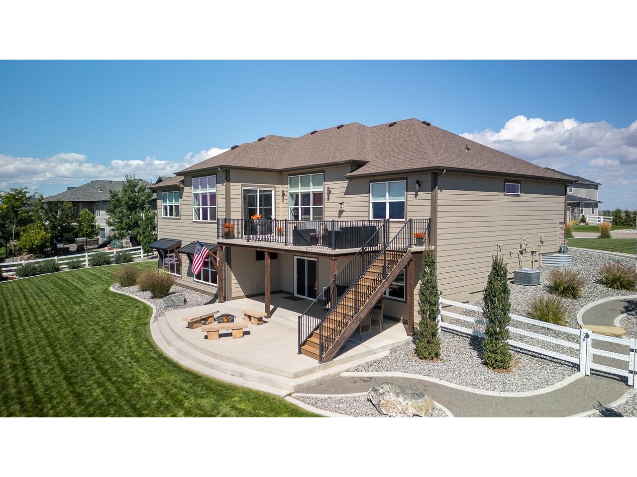 3789 Bridle Ridge Circle Severance, CO 80524 - Photo 38 of 44 a balcony with table and chairs