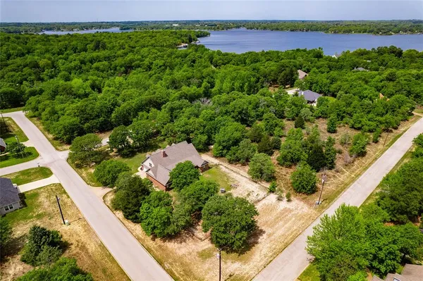 a view of a garden with a lake