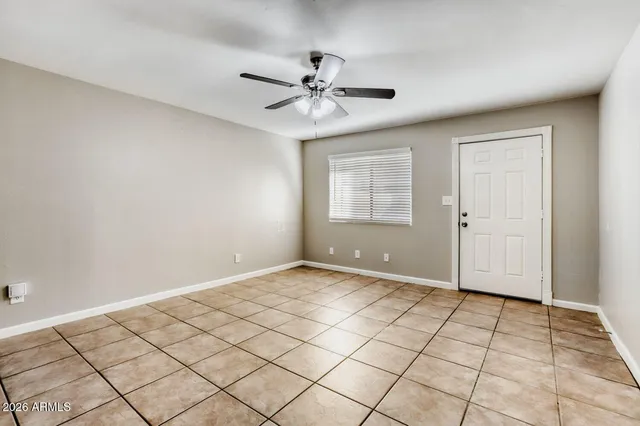 a view of an empty room and window