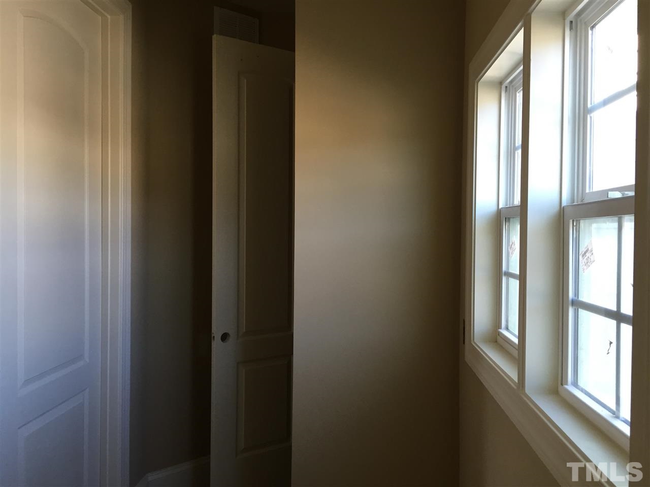 6901 Spanglers Spring Way Raleigh, NC 27610 - Photo 19 of 25 HUGE laundry room complete with a closet & tile floors