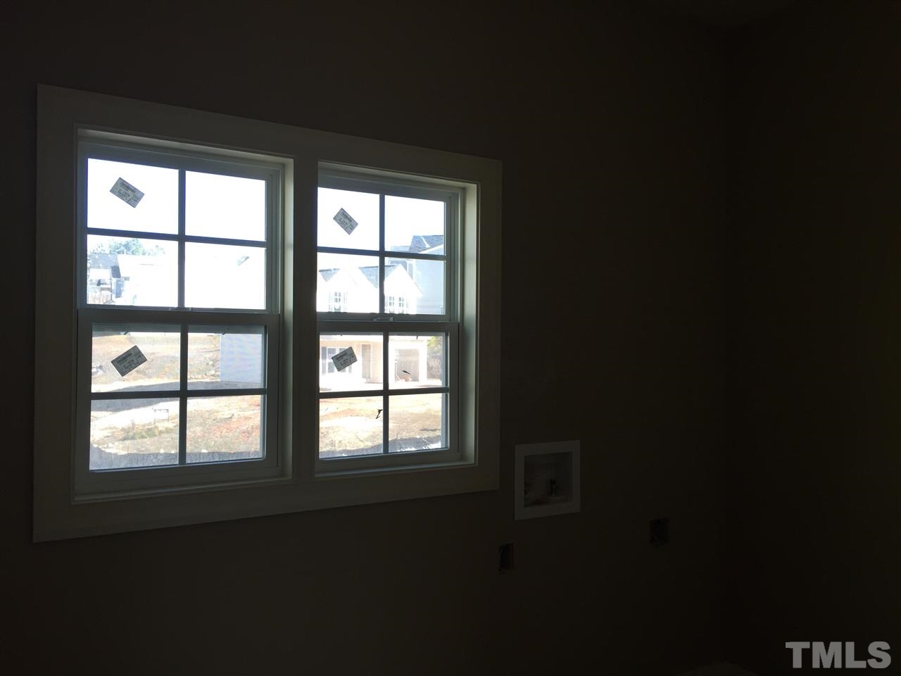 6901 Spanglers Spring Way Raleigh, NC 27610 - Photo 20 of 25 HUGE laundry room complete with a closet & tile floors