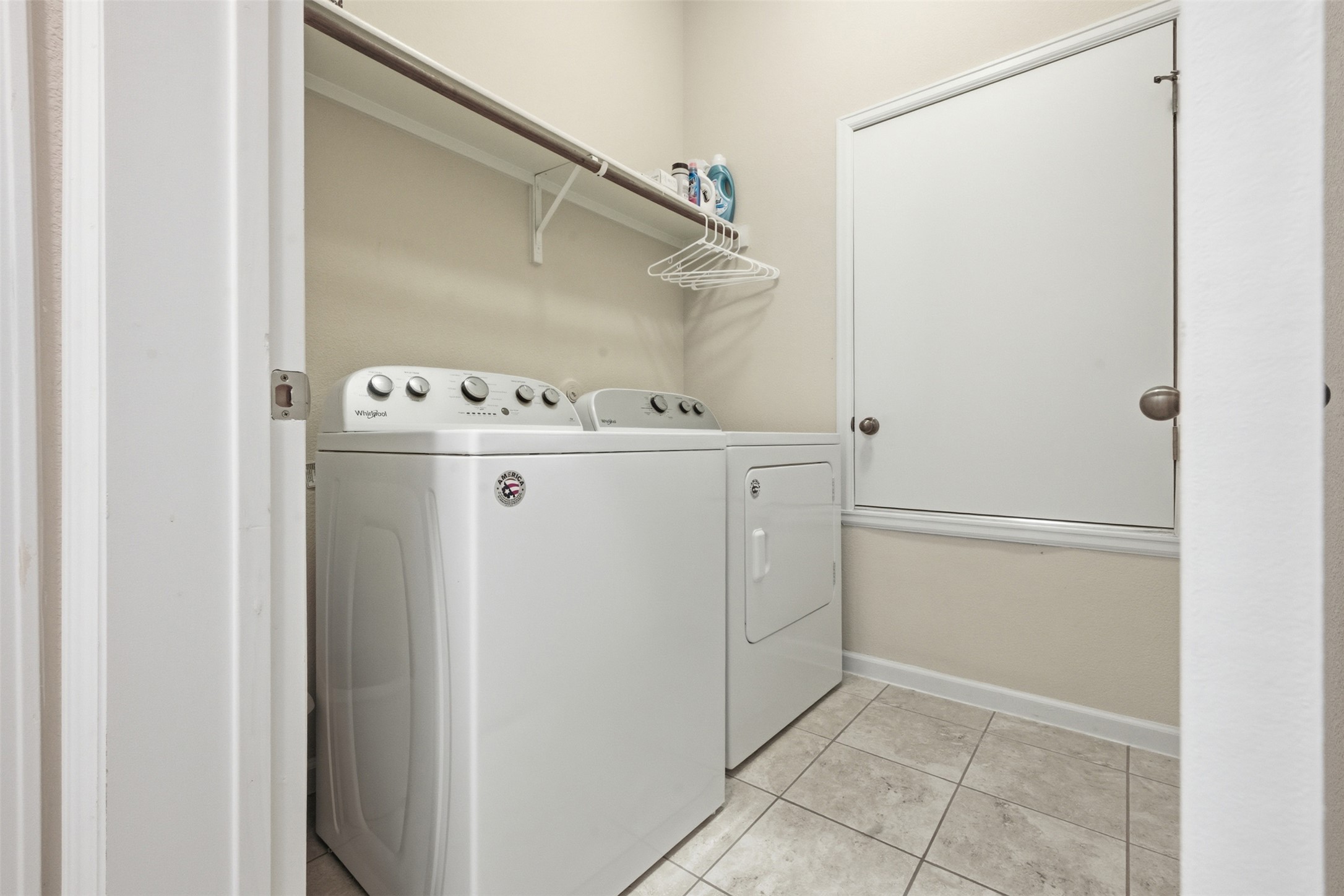 276 Gunnison Way Kyle, TX 78640 - Photo 19 of 28 a utility room with dryer and washer