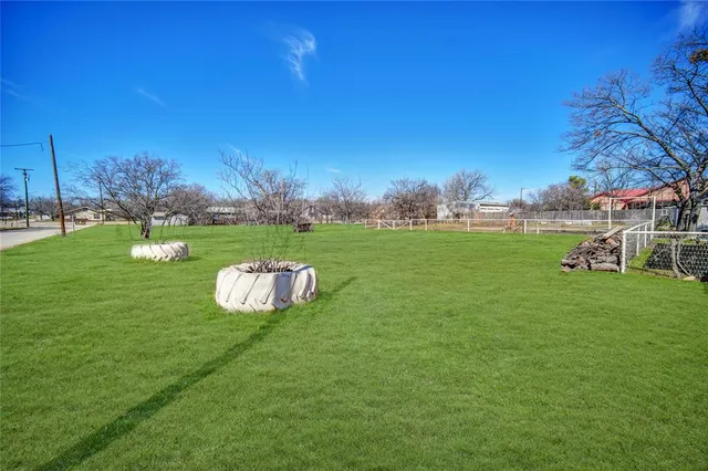 a view of a golf course with a garden