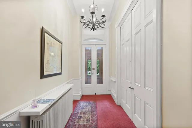 a view of a hallway with entryway