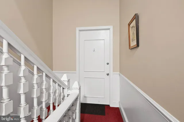 a view of a hallway with entryway