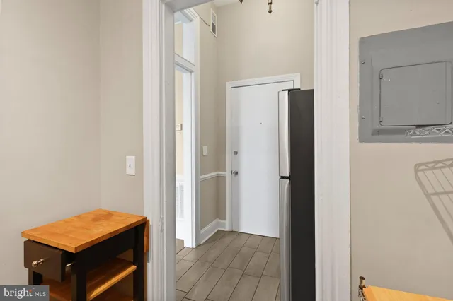 a room with closet and mirror