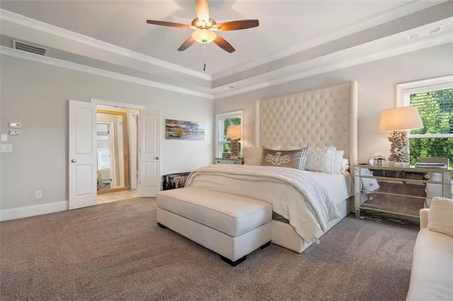 a spacious bathroom with a double vanity sink mirror and