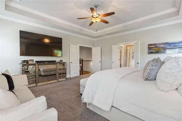 a spacious bathroom with a bathtub and a shower