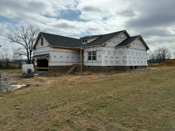 a house view with a garden space