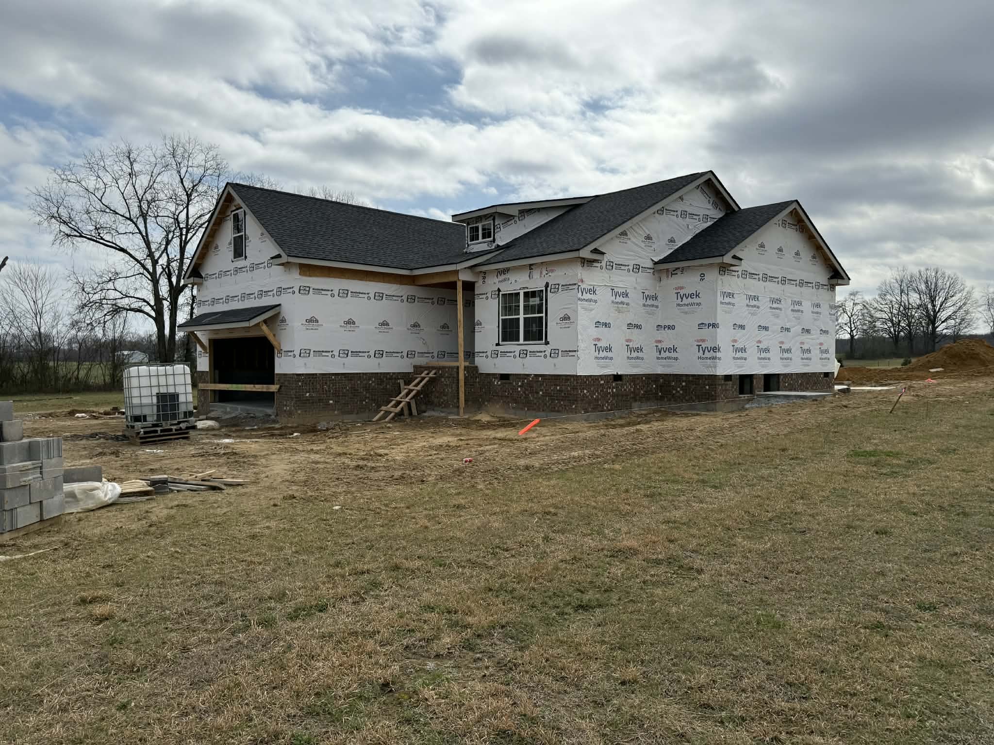 a house view with a garden space