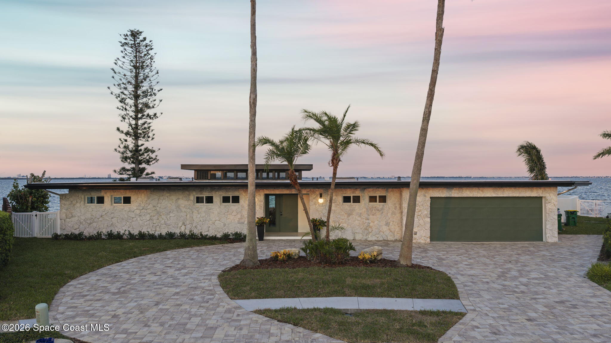 1775 East Riviera Drive Merritt Island, FL 32952 - Photo 2 of 135 127-web-or-mls-DJI_20260622200916_0558_D