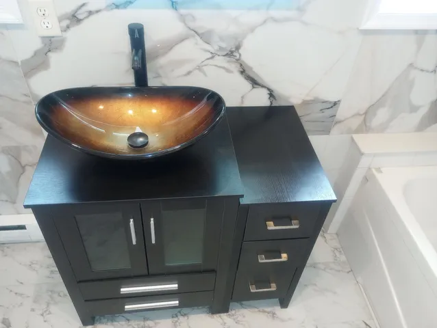 a bathroom with a toilet and a bathtub