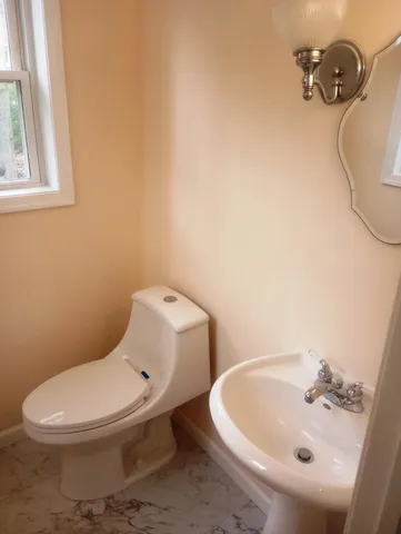 a view of a room that has a window in it