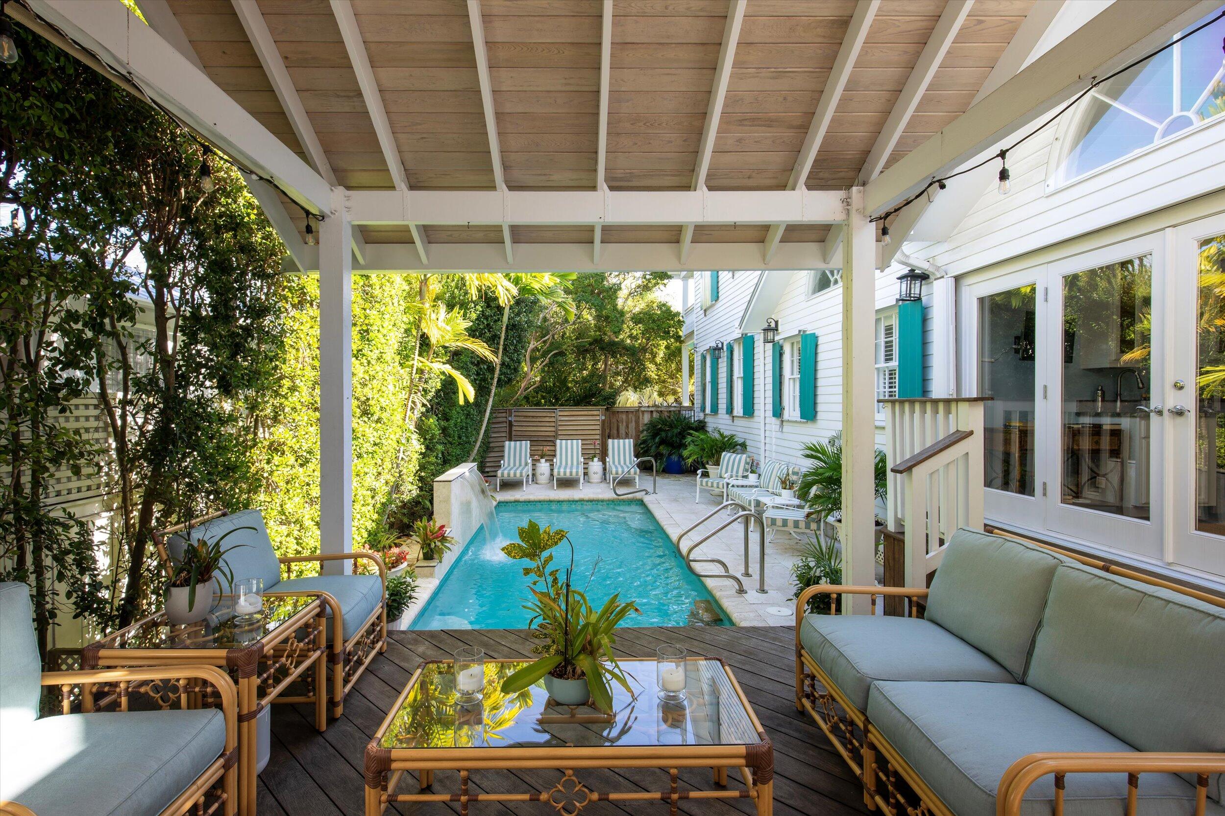 709 Eaton Street Key West, FL 33040 - Photo 14 of 37 a view of yard from deck with patio