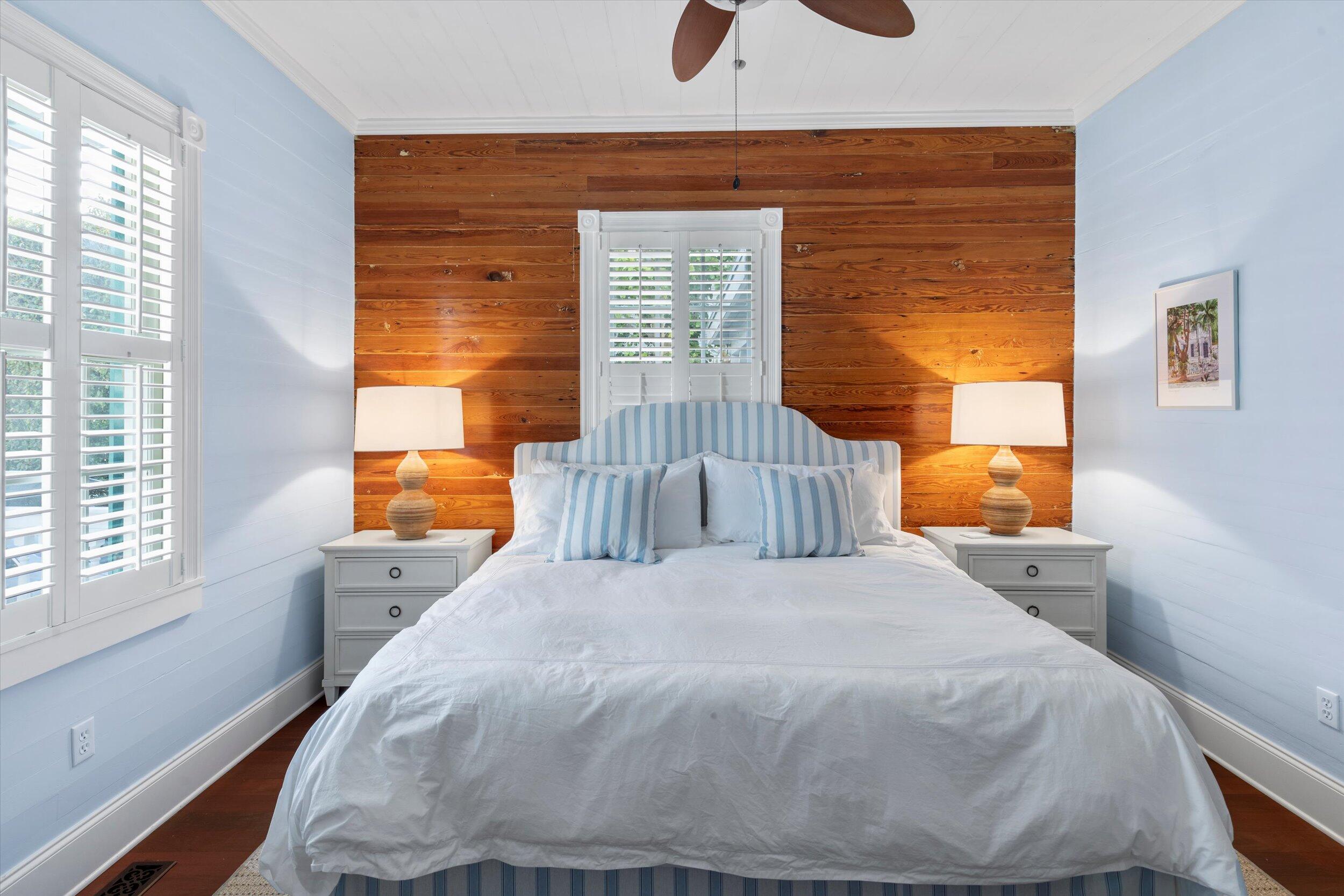 709 Eaton Street Key West, FL 33040 - Photo 18 of 37 a bedroom with a bed and window