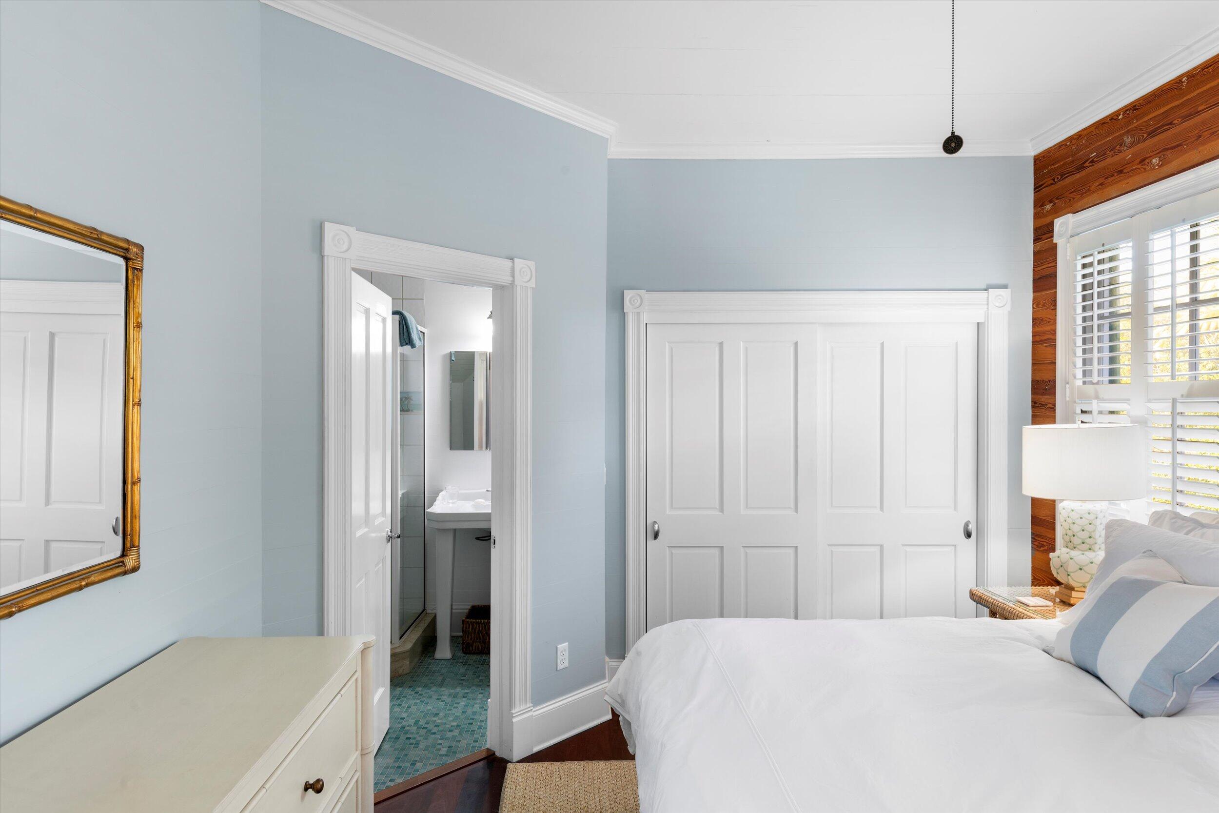 709 Eaton Street Key West, FL 33040 - Photo 21 of 37 a bedroom with a bed and a window